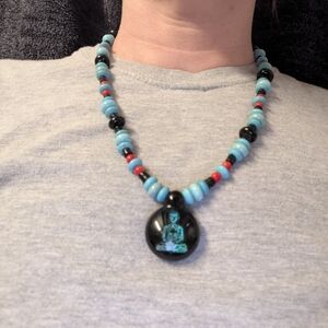 Blue and Black Beaded Necklace with Buddha Pendant